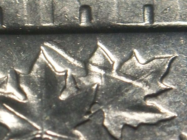 1951-Five-Cent-With-Strike-Through